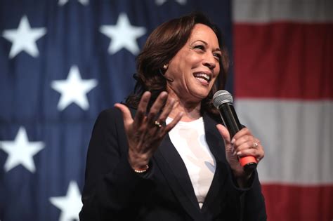 Kamala Harris speaking at a podium