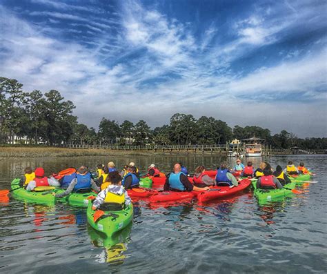 A kayaker paddling through the waters surrounding Waterworks Drive on Hilton Head Island