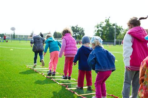 Kids participating in a boot camp building confidence