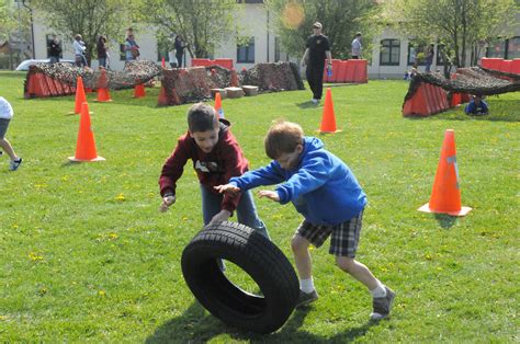 Kids participating in an obstacle course