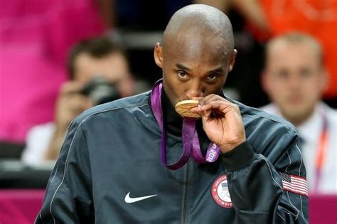 Kobe Bryant on the podium after winning a championship