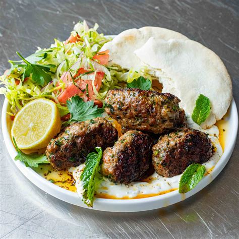 Lamb koftas with tzatziki sauce and grilled pita bread