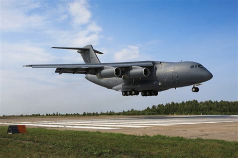 A large military aircraft on a runway