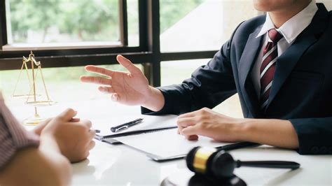 A lawyer speaking with a client on the phone