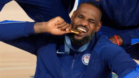 Lebron James holding the Olympic gold medal