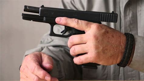 Left-handed Glock shooter in action