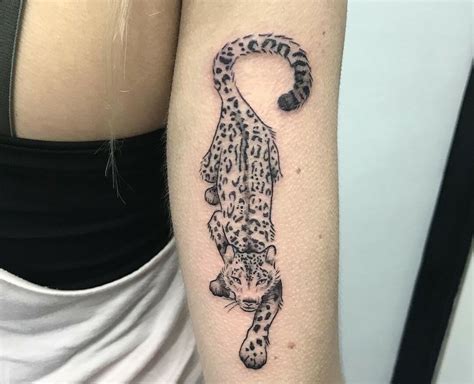 Finding inspiration for minimalist leopard tattoos