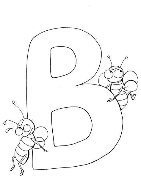 A child proudly displaying their letter B artwork