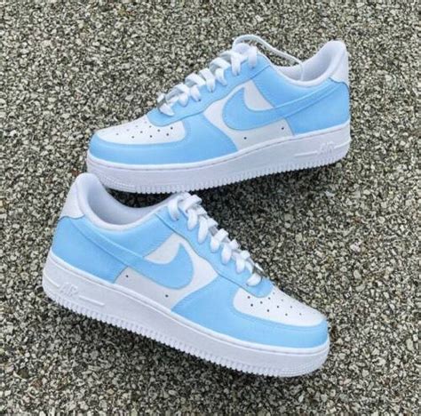 Light blue Air Forces with leggings and a sports bra