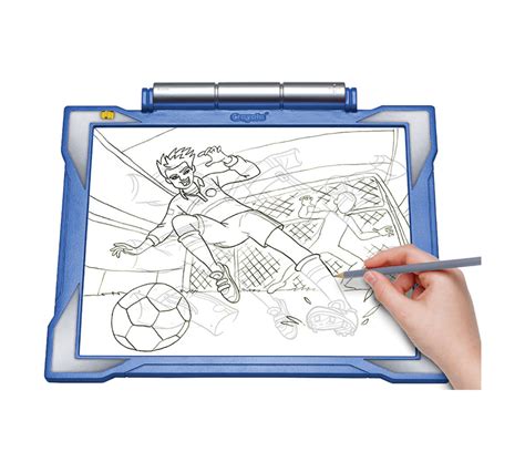 An older child creating a detailed artwork on a light up pad