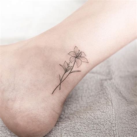 Lily flower tattoo placement