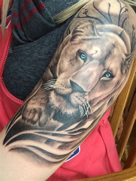 Abstract lioness tattoo