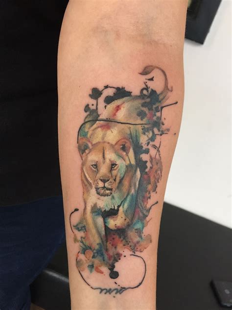 Stylized lioness tattoo