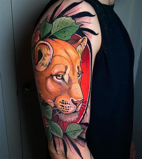 Vibrant lioness tattoo