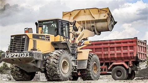 A loader loading a truck on a construction site