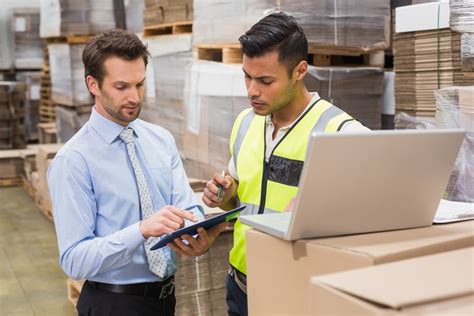 A logistics specialist working with a team