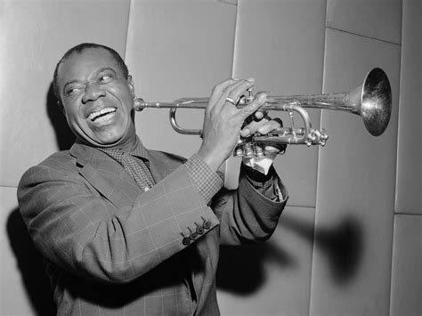 Louis Armstrong playing his trumpet