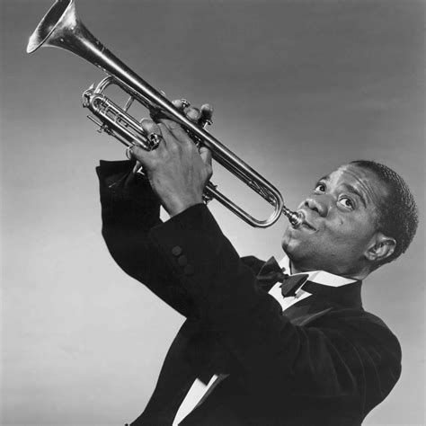 Louis Armstrong with his trumpet