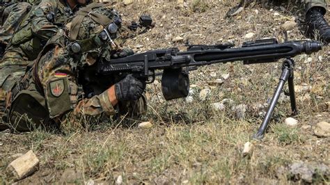 US Army Machine Gunner in action