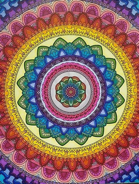 A mandala design featuring a variety of colors and geometric patterns