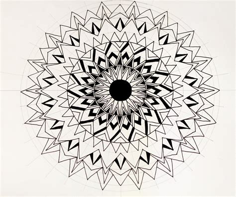 A mandala design featuring shapes and geometric patterns