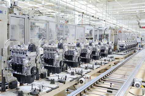 Welders working in a manufacturing plant