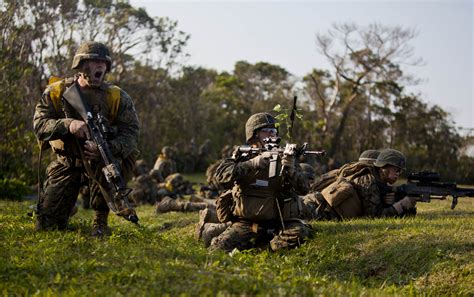 Marine Corps Fire Team Advancing on Enemy Position