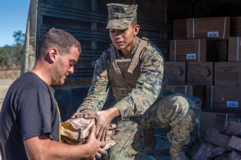 Marines of the 1st Battalion 7th Marines participating in humanitarian efforts