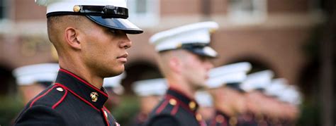 A Marine Corps officer, leading a team