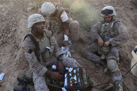 Marine Corps medics working together