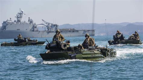 Marine Corps and Navy conducting amphibious operations