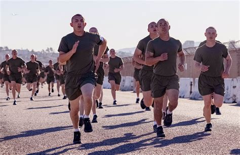 Marine performing pull-ups during the PFT