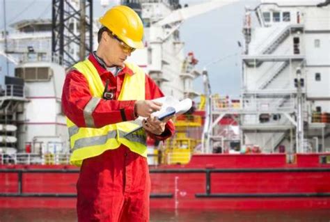 Marine engineer conducting a safety inspection