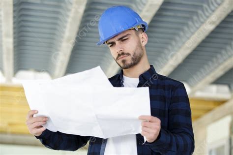 Marine Engineer Looking at Plans