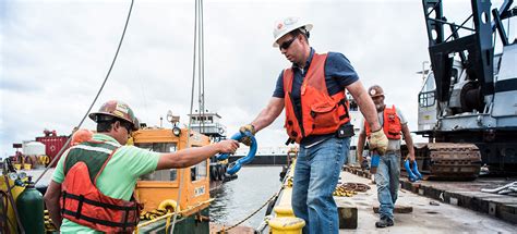 Marine Surveyor Inspecting Ship