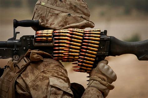 Marine machine gunner conducting reconnaissance