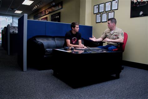 Marine recruiter in their office