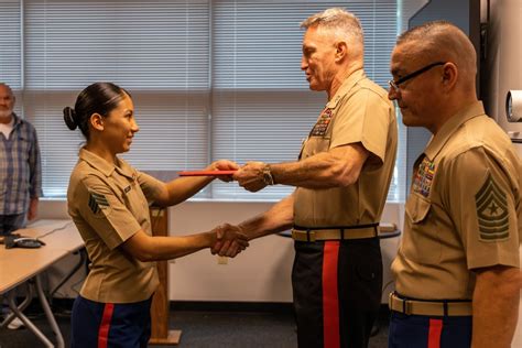 Marine recruiter receiving an award