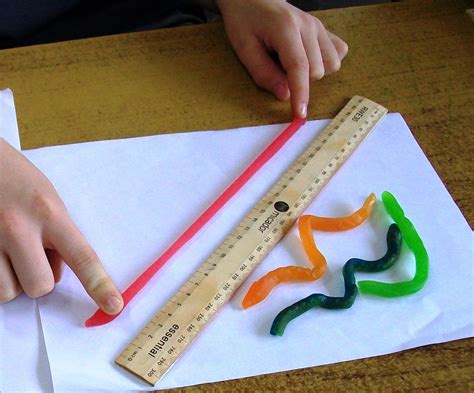 A person measuring the length of a room using a tape measure