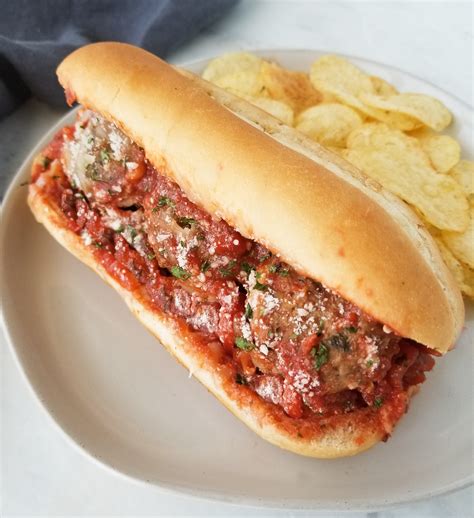 A Meatball sub sandwich, complete with homemade meatballs and marinara sauce