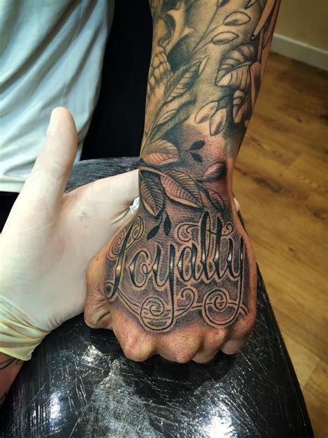 Mens hand tattoo placement