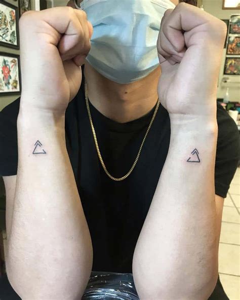 Mens small wrist tattoos