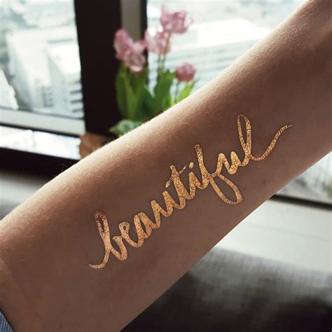 Metallic gold tattoo ink