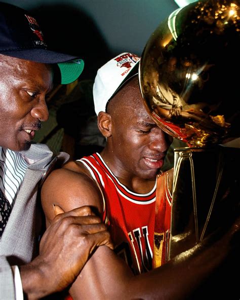 Michael Jordan with championship trophy