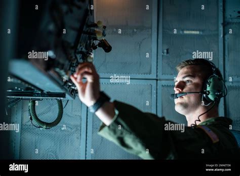 Aircrew performing mid-air refueling