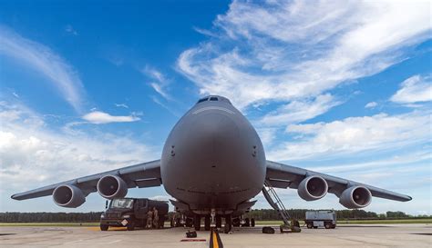 A large military aircraft on a runway