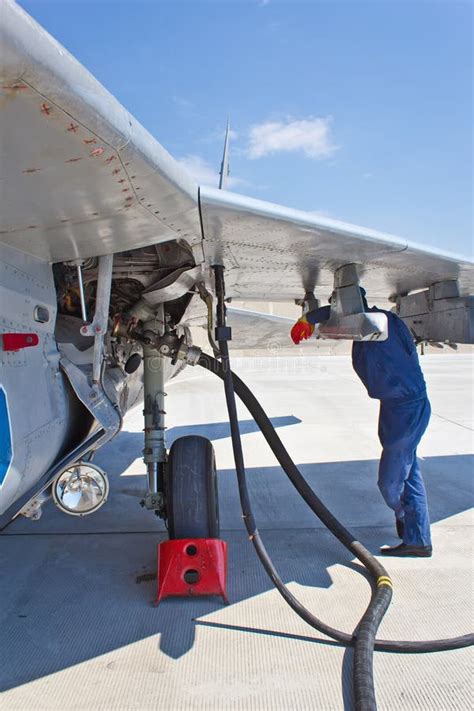 A military aircraft refueling in mid-air