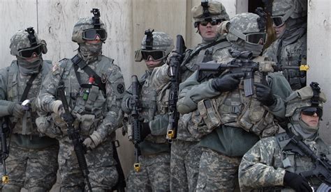 Military personnel during a mission briefing