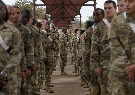 soldiers laughing together