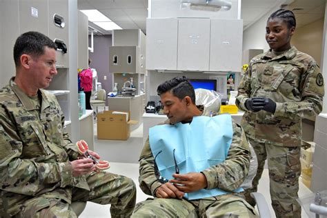 Military dentists in a hospital setting